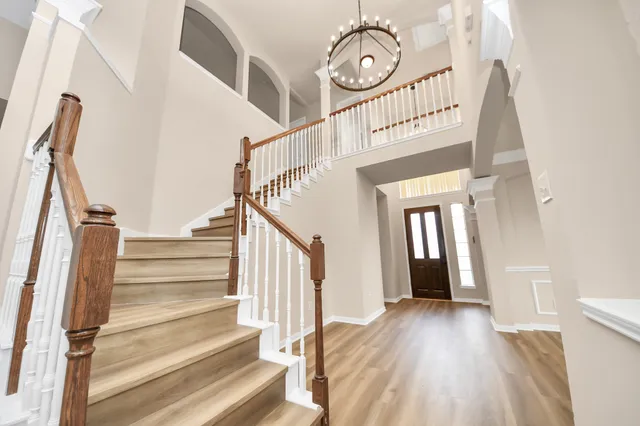 a view of entryway with wooden floor