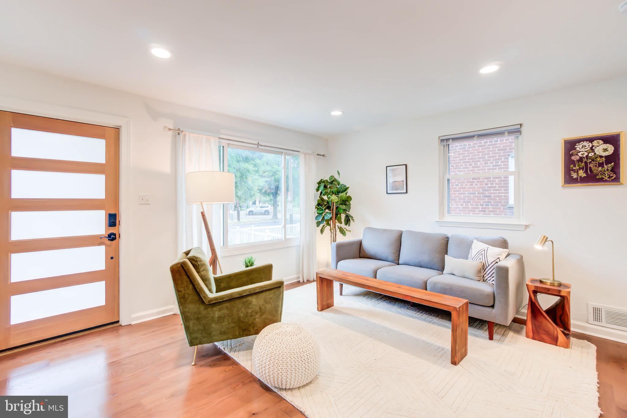 459 Riggs Road Northeast Washington, DC 20011 - Photo 11 of 57 a living room with furniture and a window