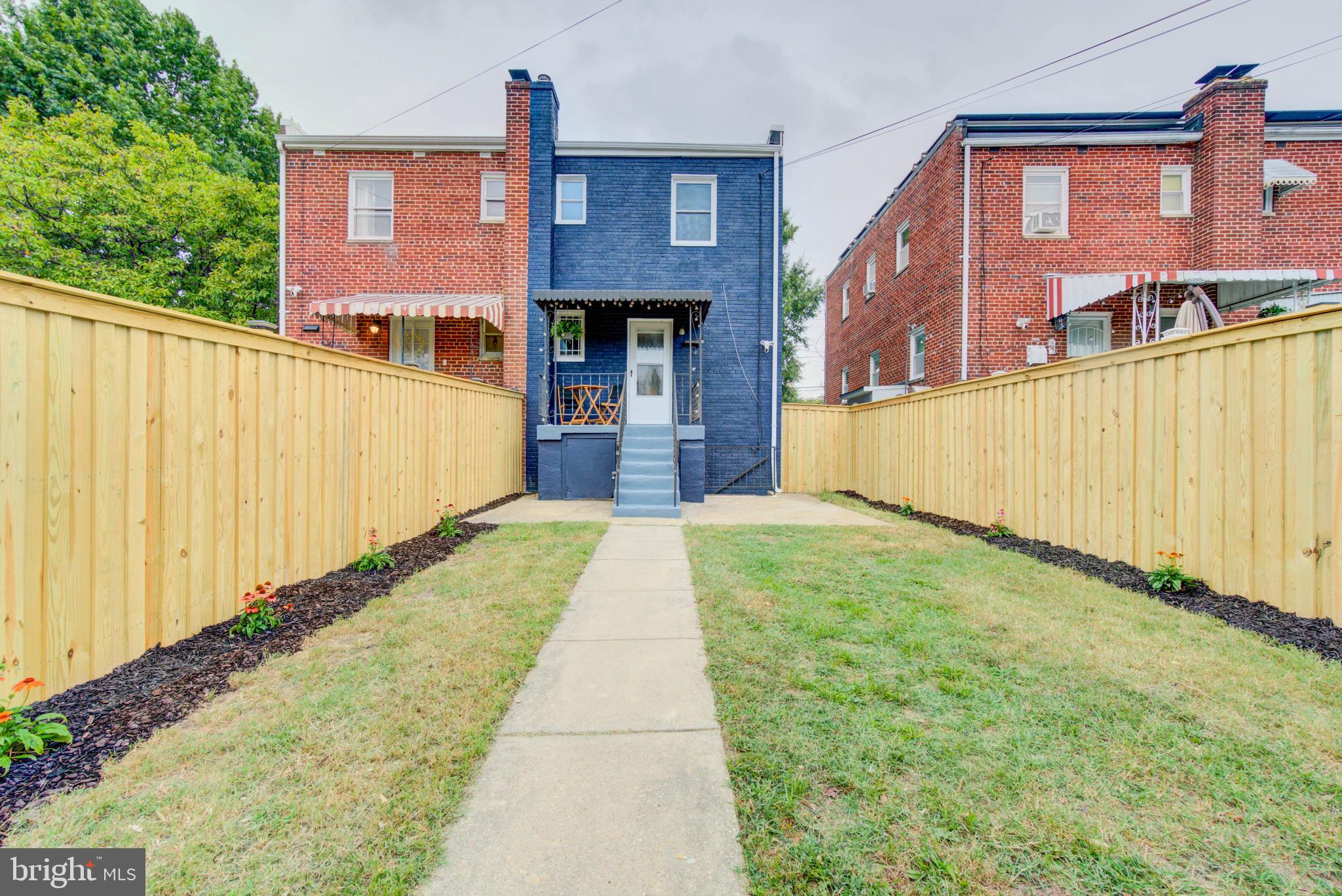 459 Riggs Road Northeast Washington, DC 20011 - Photo 26 of 57 a view of a back yard with a building