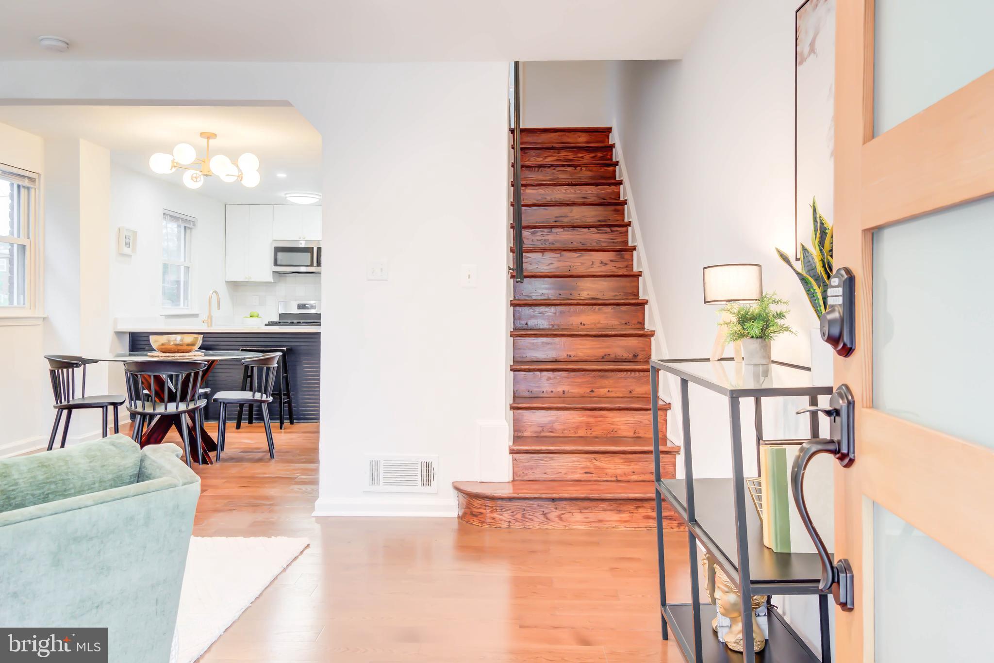 459 Riggs Road Northeast Washington, DC 20011 - Photo 28 of 57 a view of a dining room with furniture and a potted plant