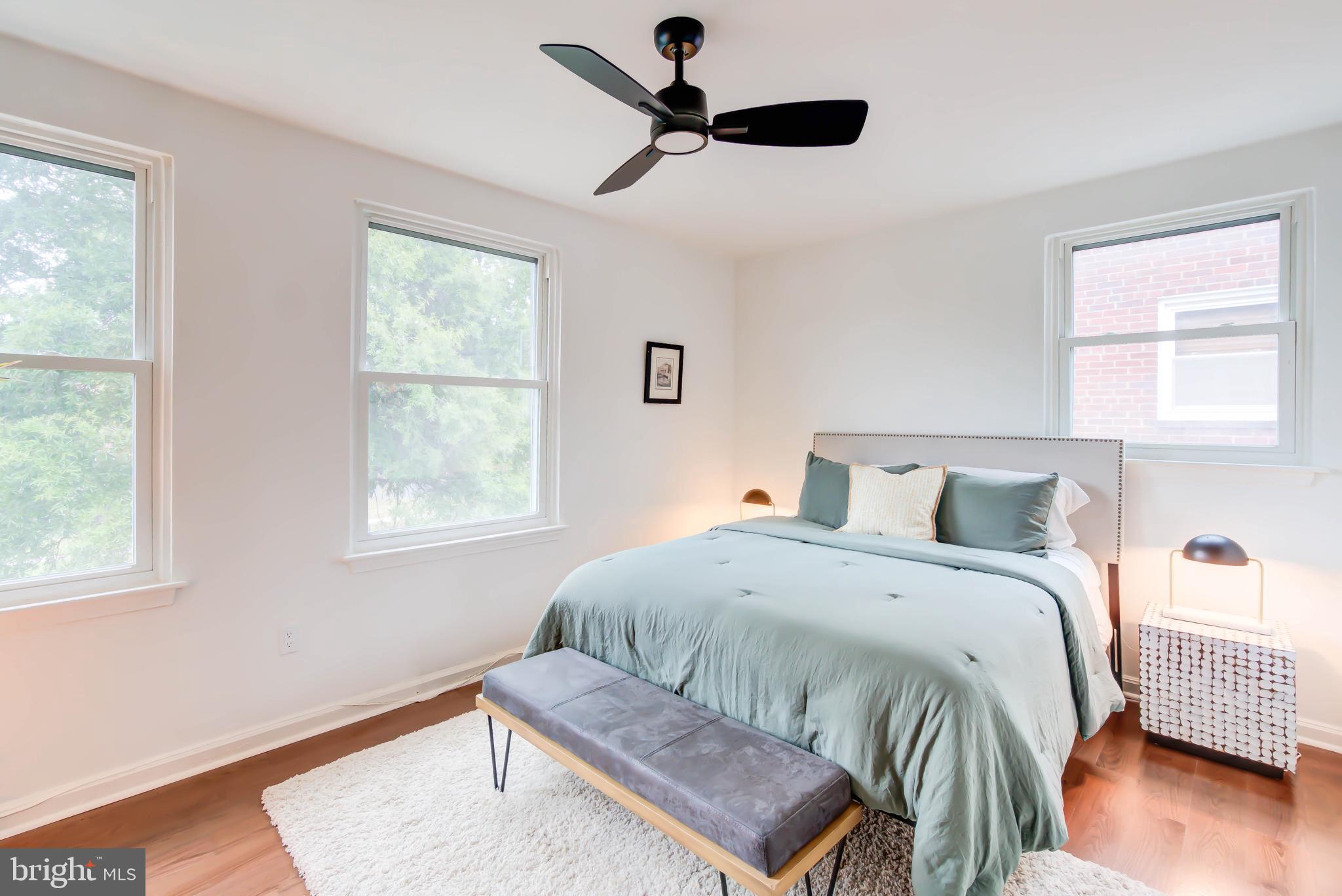 459 Riggs Road Northeast Washington, DC 20011 - Photo 29 of 57 a bedroom with a bed and a window