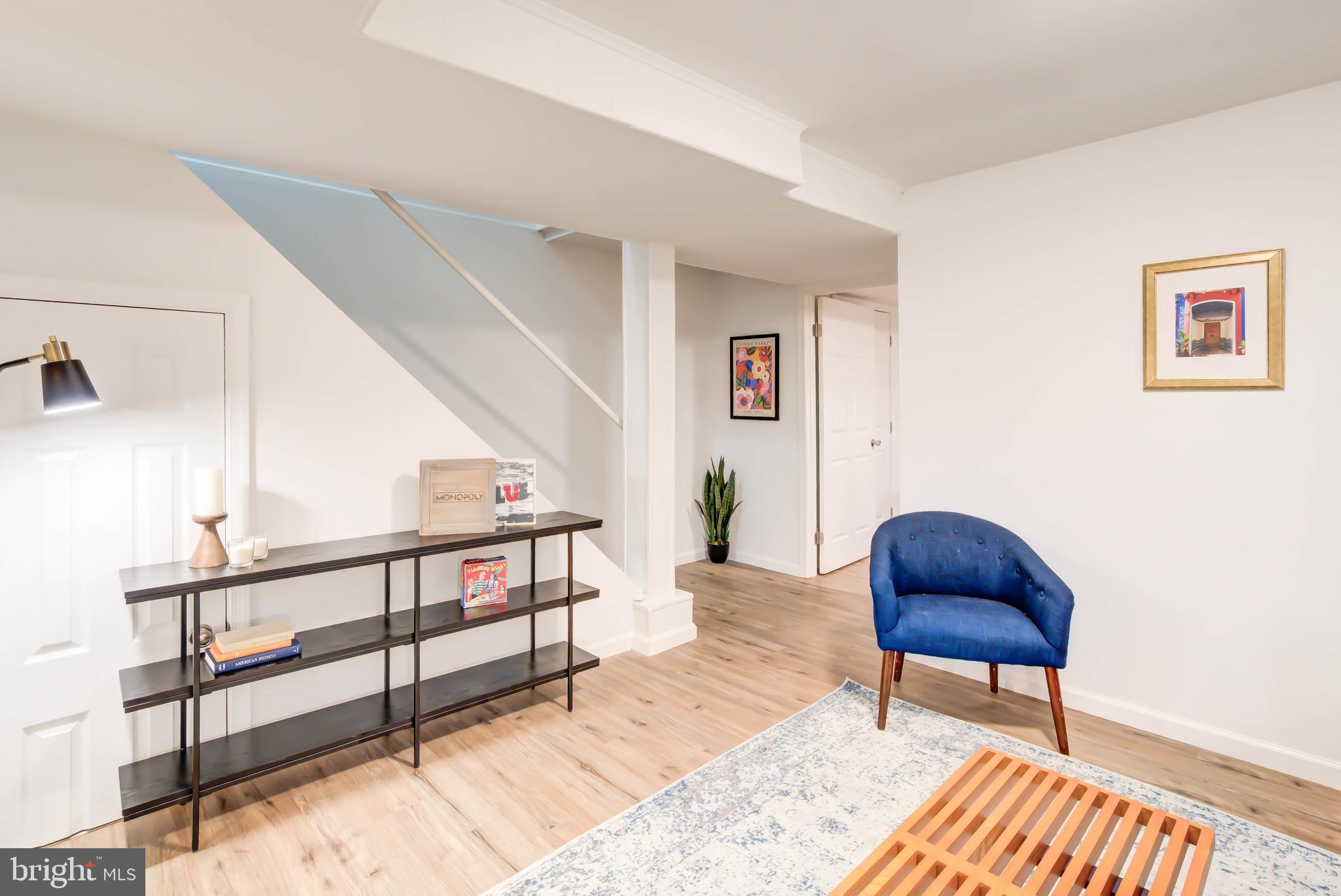 459 Riggs Road Northeast Washington, DC 20011 - Photo 39 of 57 a living room with furniture and a wooden floor