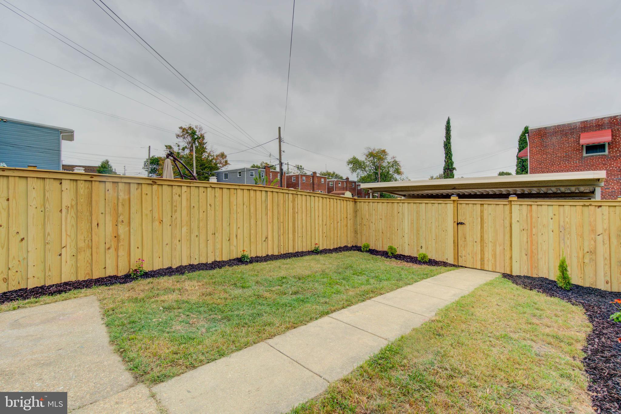459 Riggs Road Northeast Washington, DC 20011 - Photo 46 of 57 a view of a backyard with a cabin