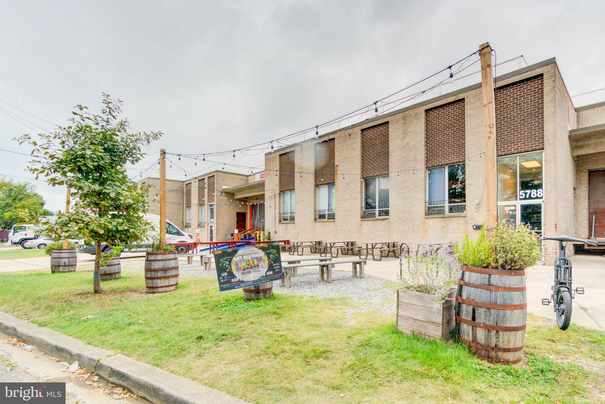 459 Riggs Road Northeast Washington, DC 20011 - Photo 51 of 57 a view of a house with backyard and sitting area