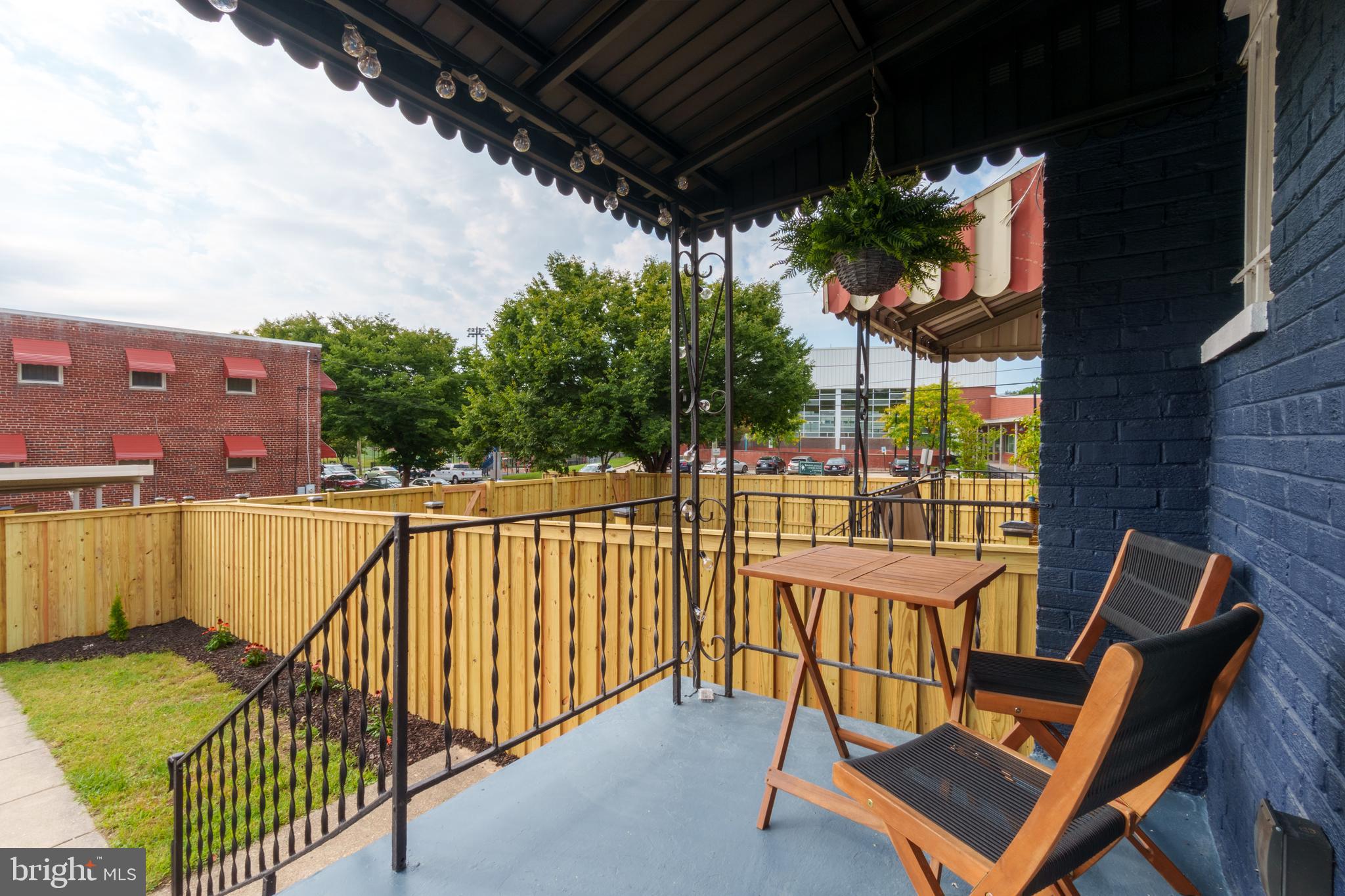 459 Riggs Road Northeast Washington, DC 20011 - Photo 6 of 57 a view of a chairs and table in the balcony