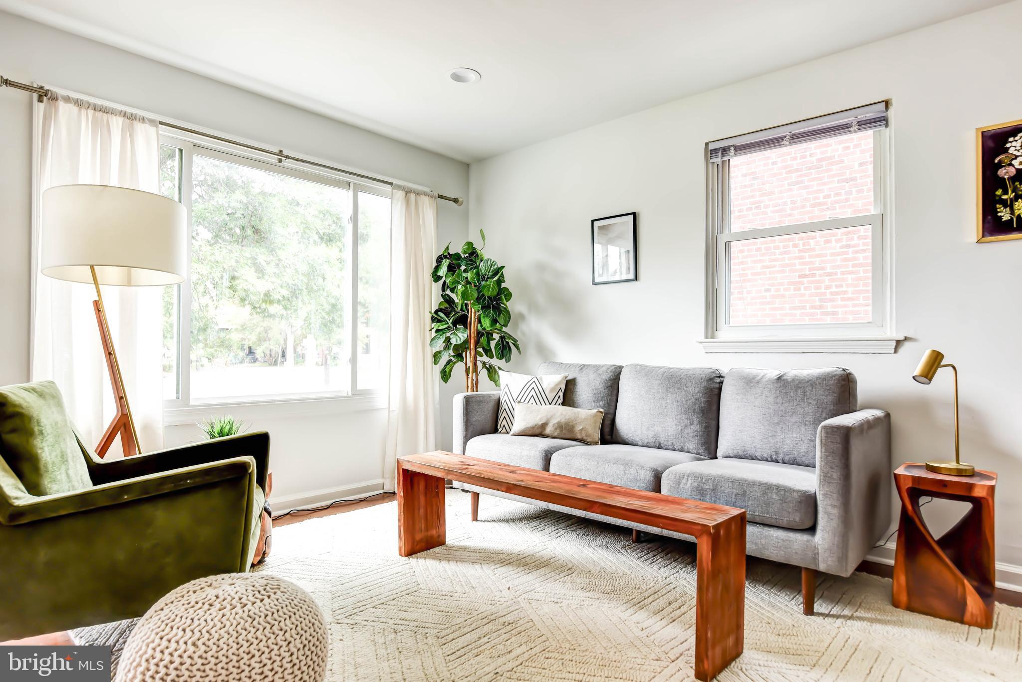 459 Riggs Road Northeast Washington, DC 20011 - Photo 9 of 57 a living room with furniture and a window
