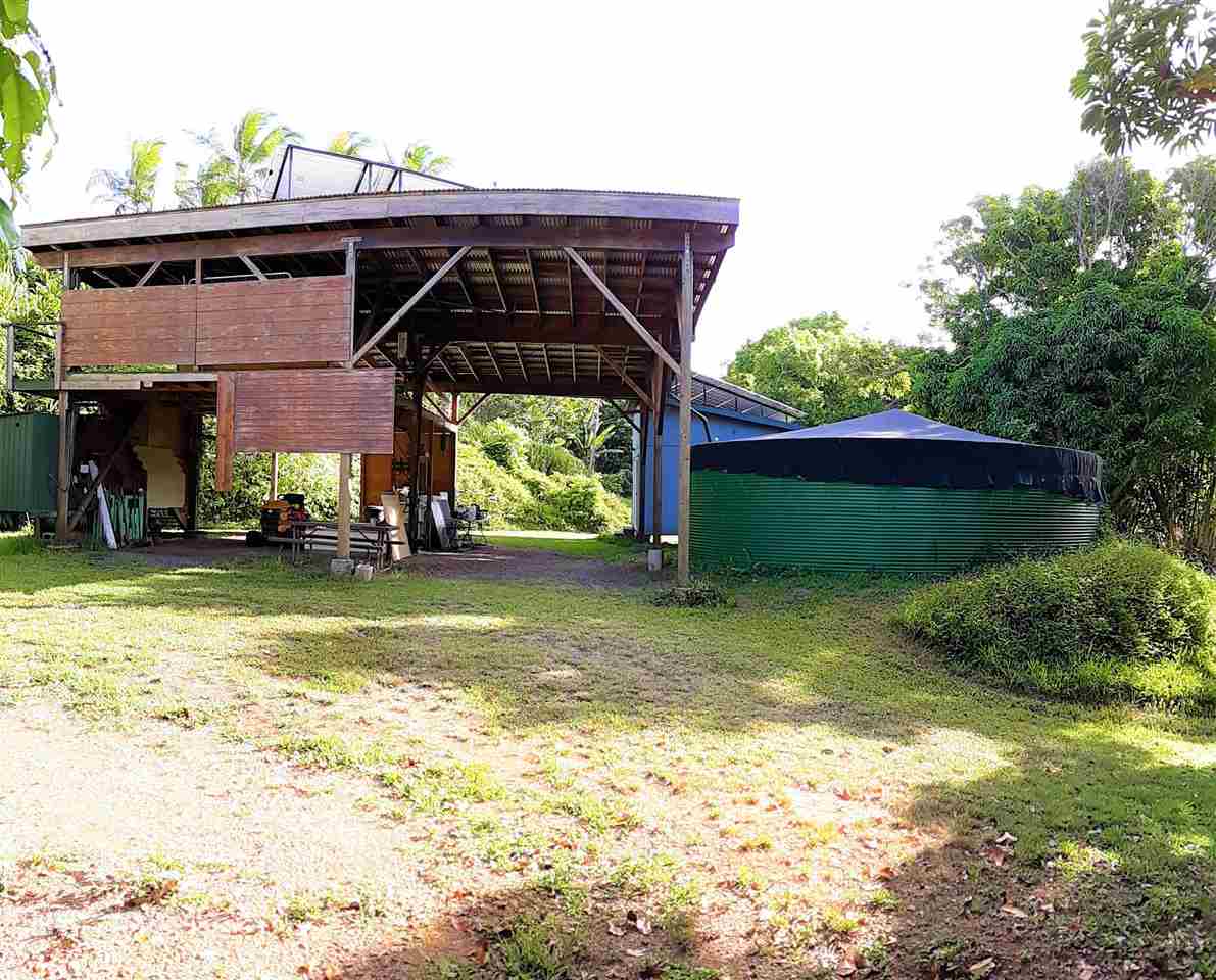 350 Hoolawa Road Haiku, HI 96708 - Photo 6 of 23 a front view of a house with a yard