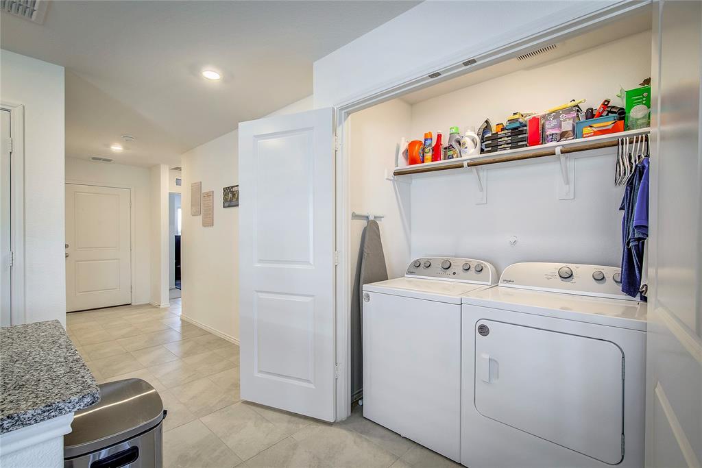 6000 Sumlin Way Princeton, TX 75407 - Photo 15 of 36 Dedicated laundry area with washer and dryer connections, built-in storage shelf, and recessed lighting.