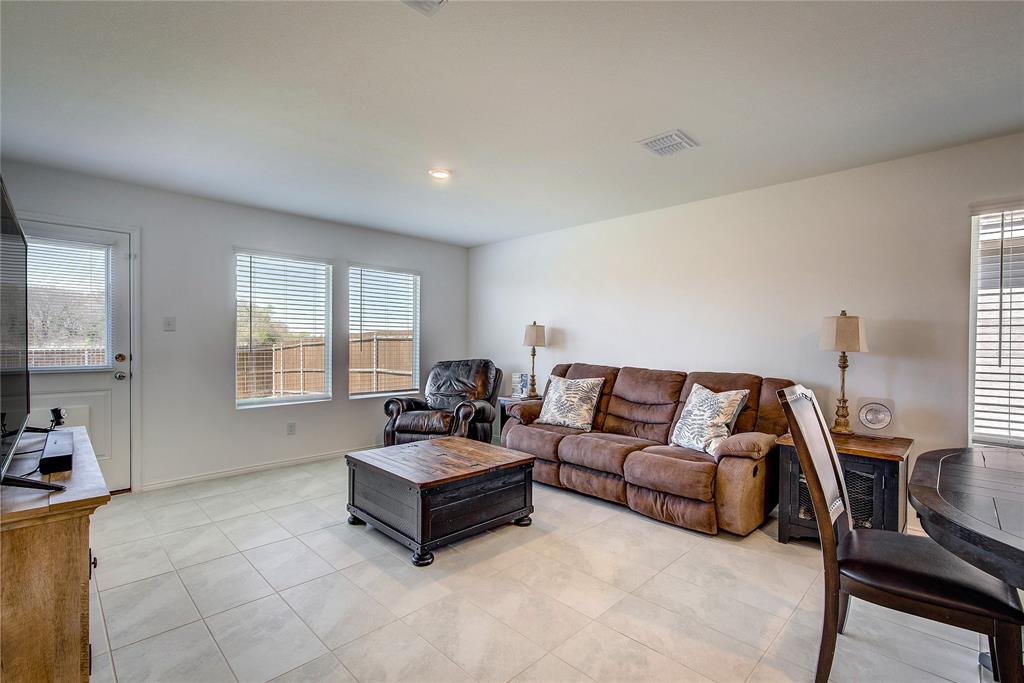 6000 Sumlin Way Princeton, TX 75407 - Photo 20 of 36 Living Room View 2 – Open-concept living with great natural light and backyard access.