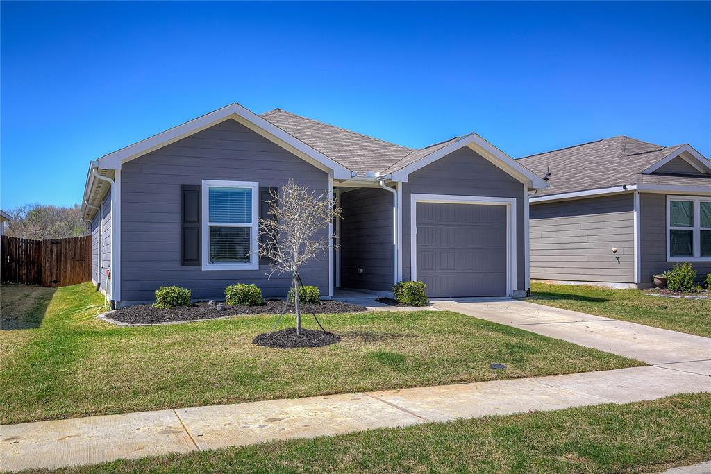6000 Sumlin Way Princeton, TX 75407 - Photo 2 of 36 Front Exterior –Charming single-story home with clean landscaping, covered entry, and attached 1-car garage.