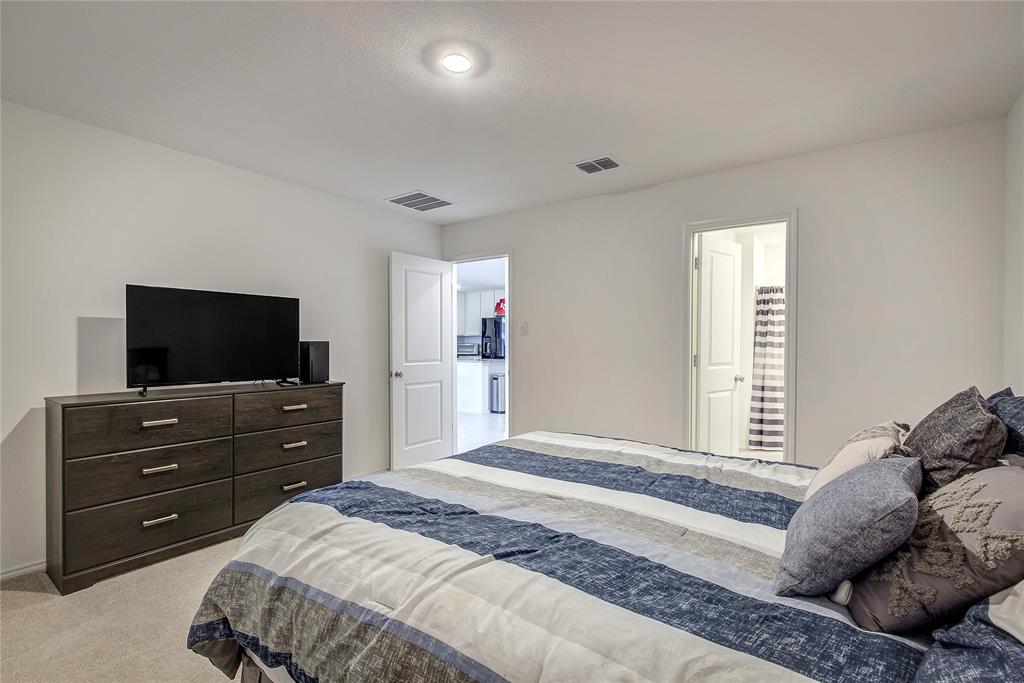 6000 Sumlin Way Princeton, TX 75407 - Photo 23 of 36 Primary Bedroom View – Generous primary suite with soft carpet and neutral tones.