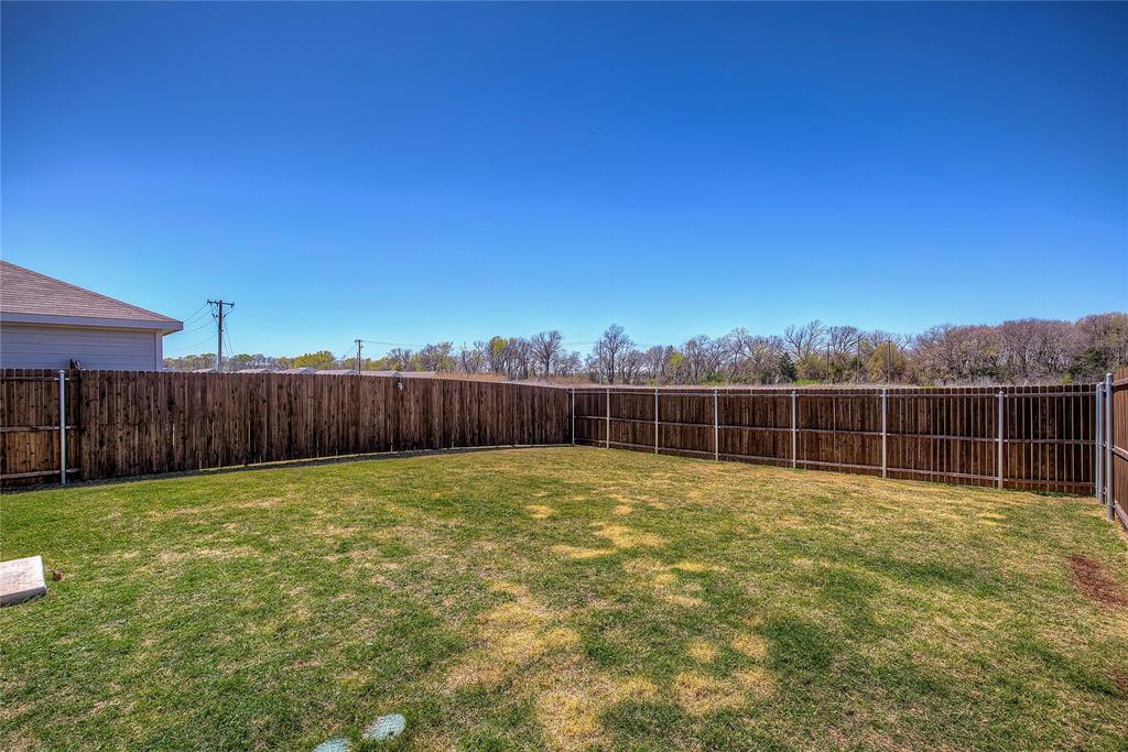 6000 Sumlin Way Princeton, TX 75407 - Photo 36 of 36 Backyard View – Large, fully fenced backyard with room to play or entertain.