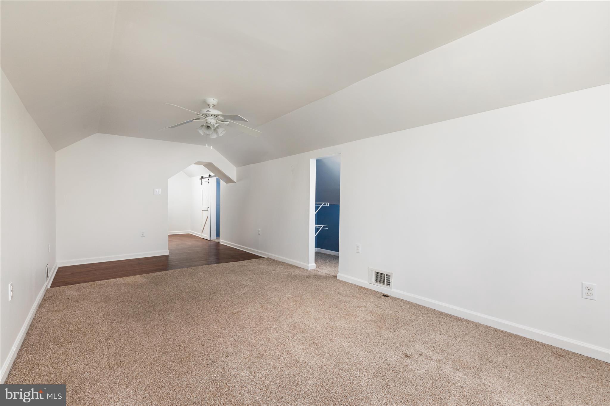 1200 Salem Church Road Stephens City, VA 22655 - Photo 27 of 69 a view of a big room with a chandelier fan
