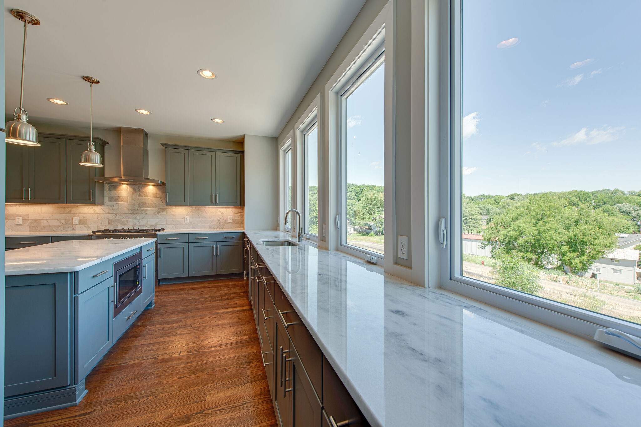 119 Demoss Road Nashville, TN 37209 - Photo 13 of 38 a large kitchen with kitchen island granite countertop a large window