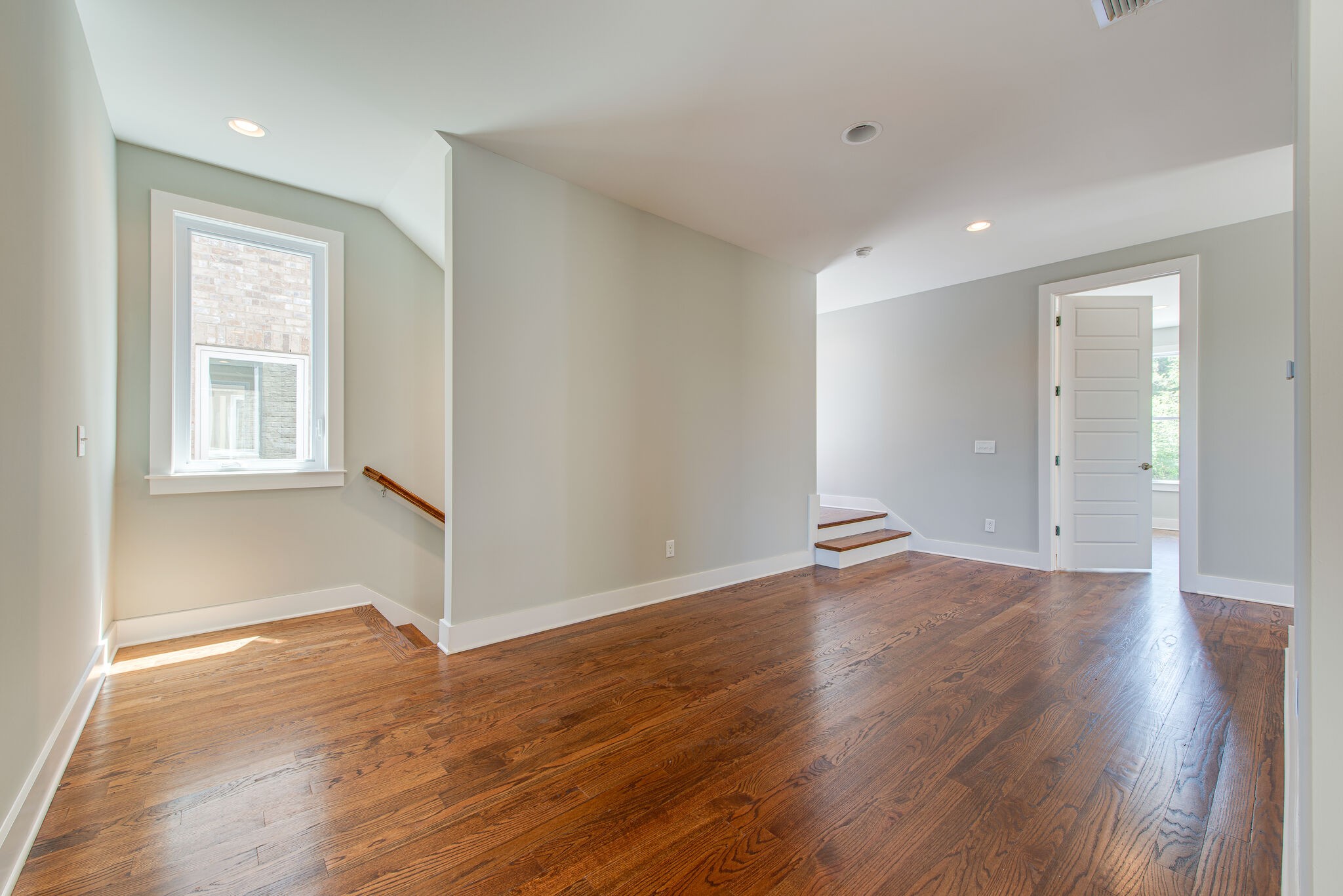 119 Demoss Road Nashville, TN 37209 - Photo 16 of 38 an empty room with wooden floor and windows