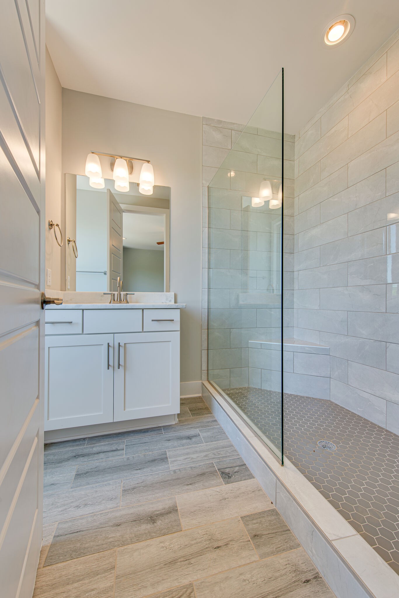 119 Demoss Road Nashville, TN 37209 - Photo 19 of 38 a bathroom with a shower sink and mirror