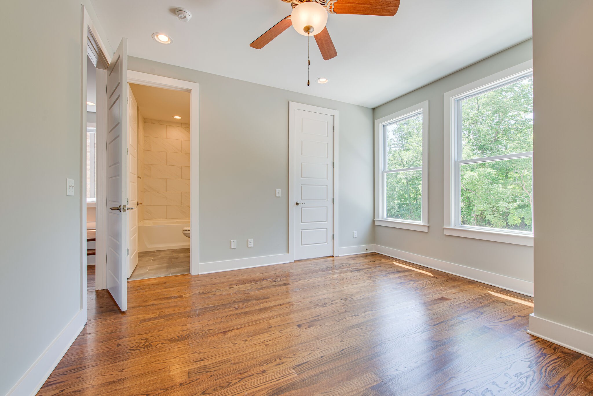 119 Demoss Road Nashville, TN 37209 - Photo 23 of 38 a view of an empty room with wooden floor and a window