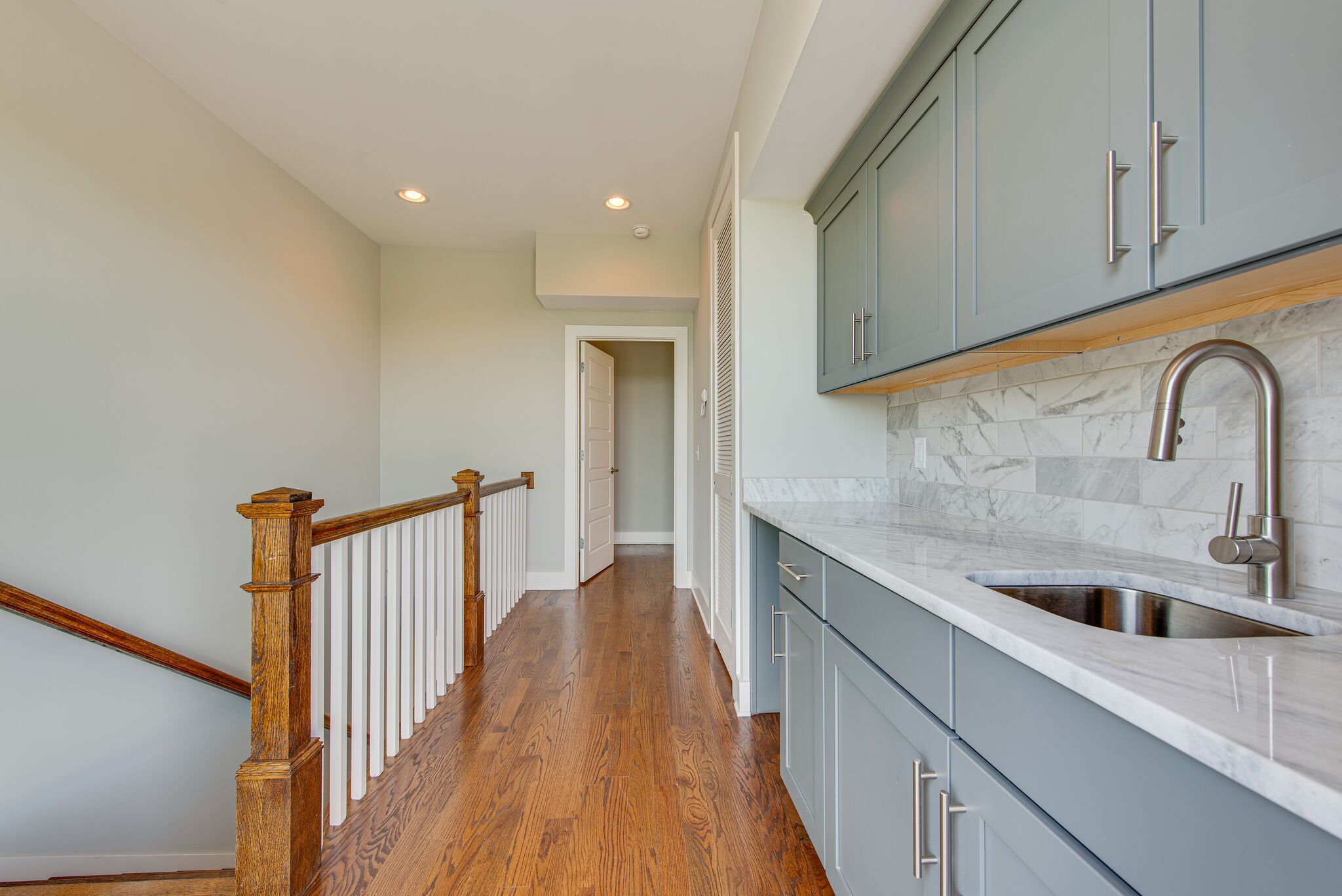 119 Demoss Road Nashville, TN 37209 - Photo 27 of 38 a kitchen with a sink cabinets and wooden floor