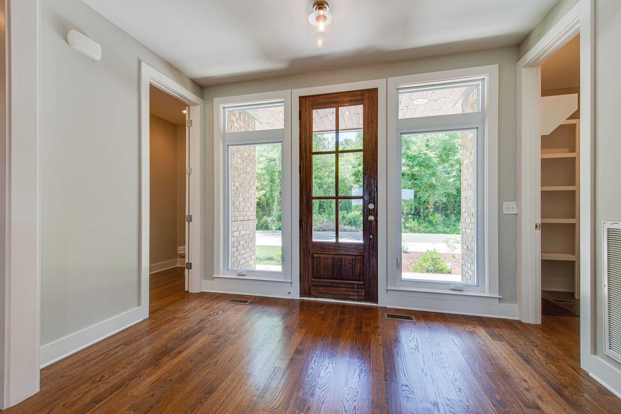 119 Demoss Road Nashville, TN 37209 - Photo 5 of 38 an empty room with wooden floor and windows