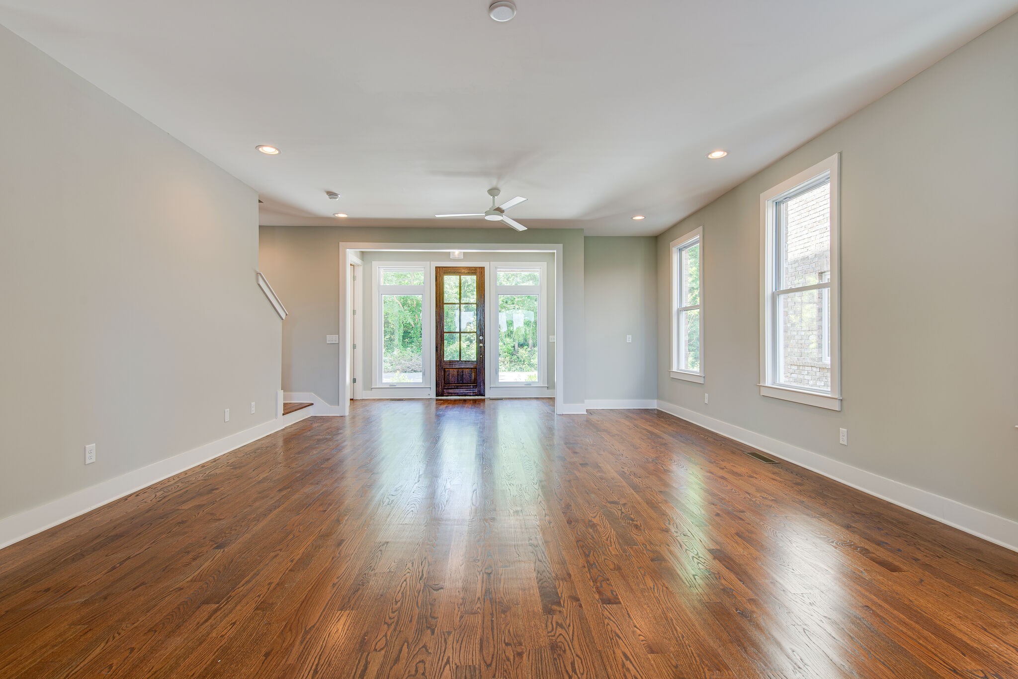 119 Demoss Road Nashville, TN 37209 - Photo 8 of 38 a view of an empty room with wooden floor and a window
