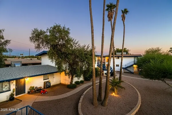 a view of a patio with swimming pool
