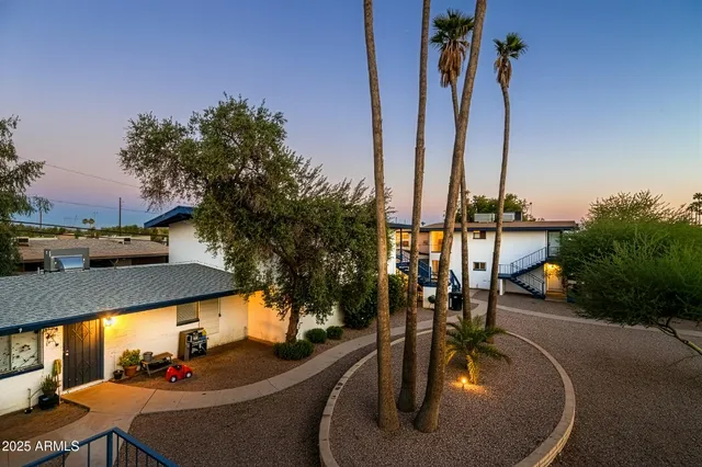 a view of a patio with swimming pool