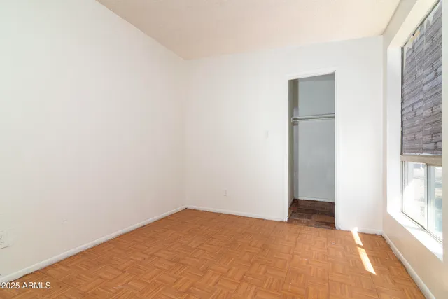 a view of a building with sitting area