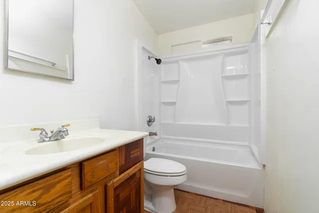 a patio with table and chairs