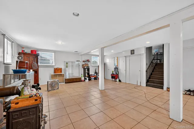a view of a livingroom with furniture and toys
