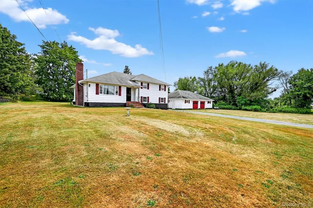 a view of a house with a swimming pool