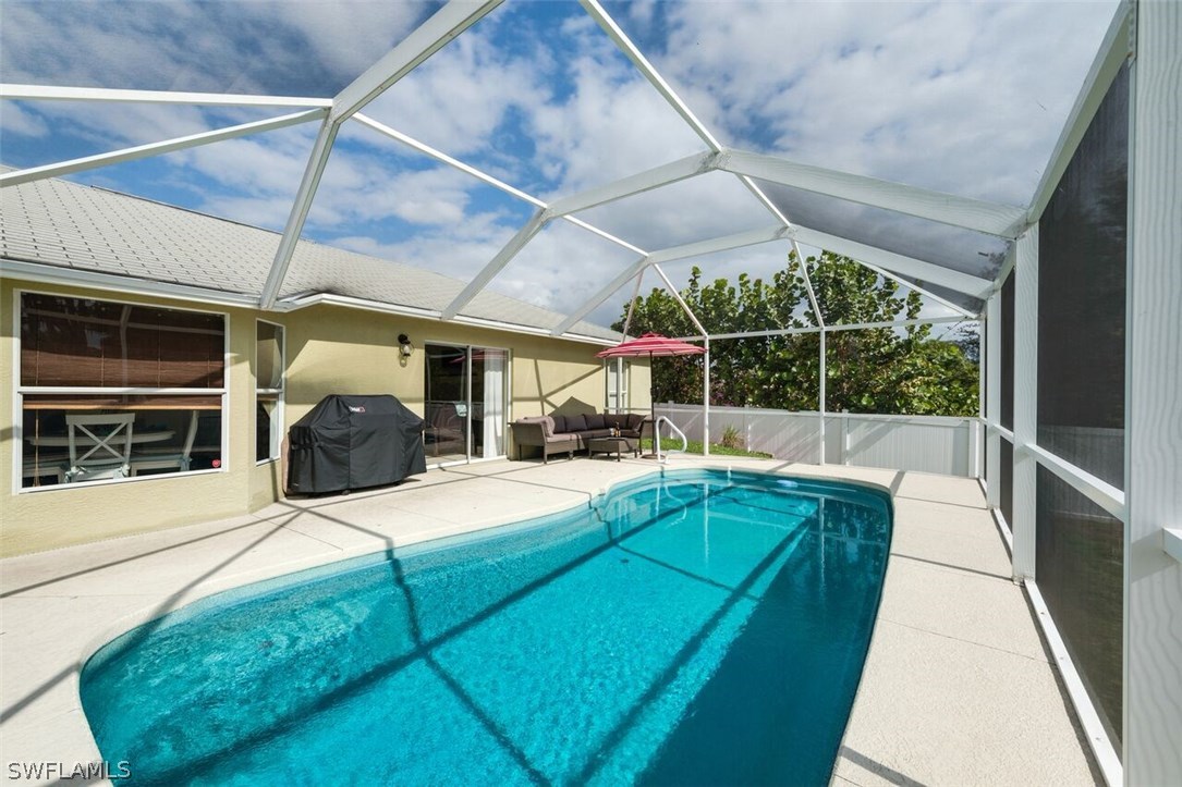 7274 Myrtle Road Fort Myers, FL 33967 - Photo 1 of 25 a view of a backyard with sitting area