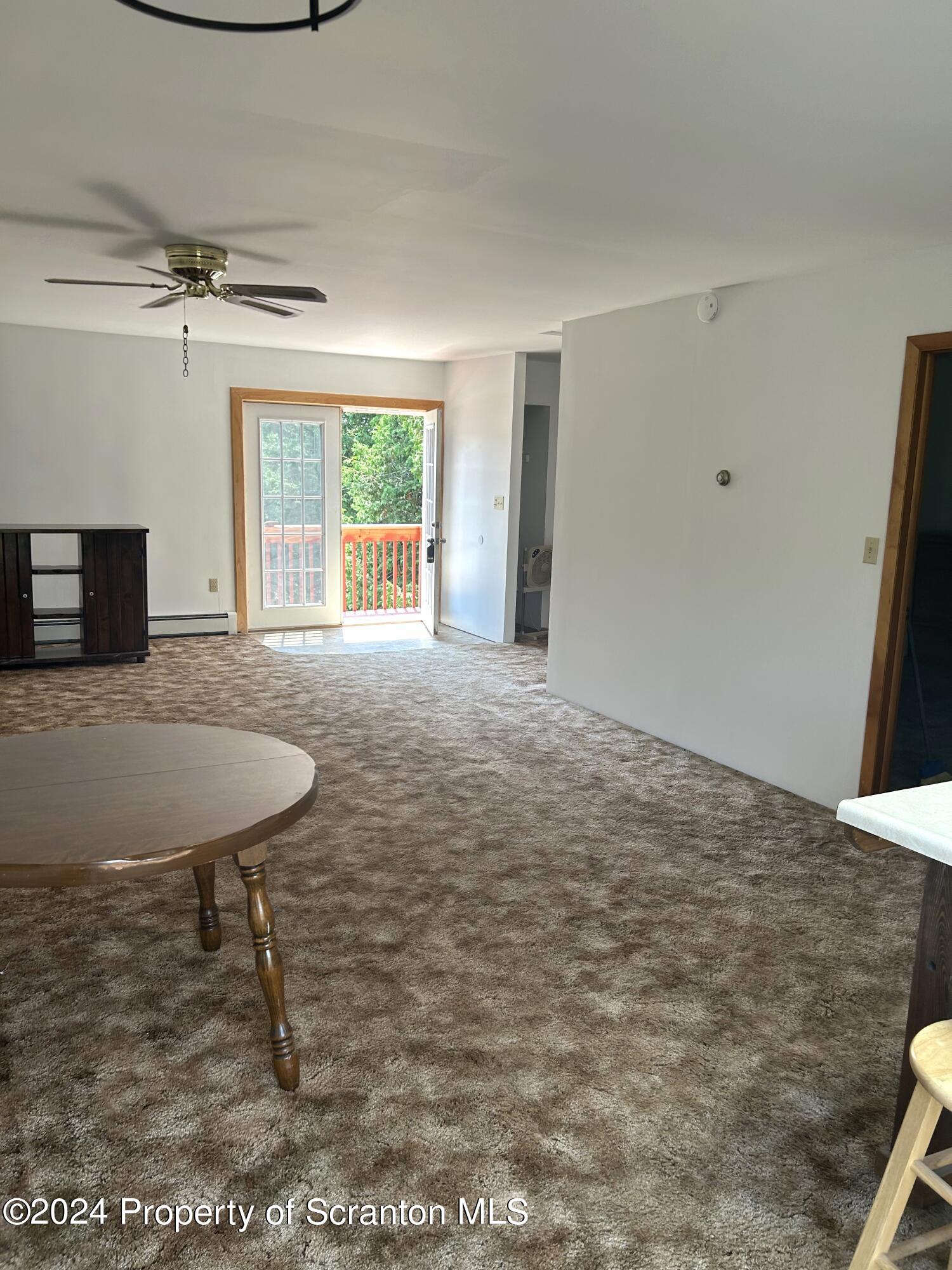 80 Worth Church Road Jermyn, PA 18433 - Photo 11 of 16 a view of an empty room with a window