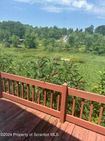 a view of a balcony with outdoor space