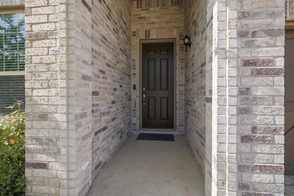 3728 Evergreen Ridge Road Fort Worth, TX 76244 - Photo 5 of 21 Brick facade with varied light and dark tones