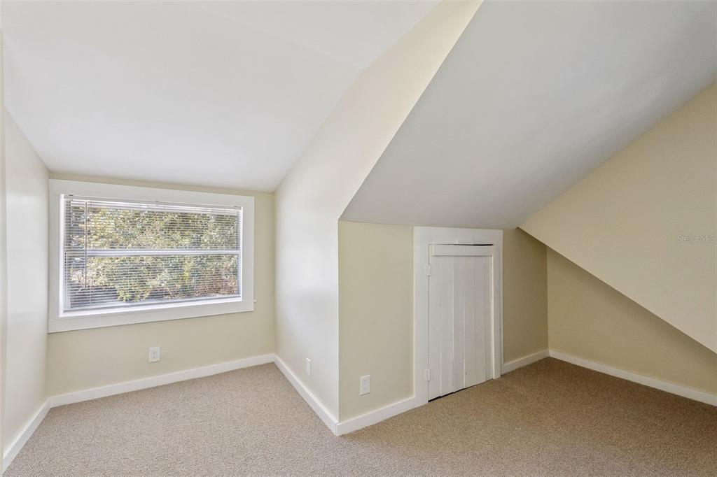 5108 South Ridgewood Avenue Port Orange, FL 32127 - Photo 28 of 44 a view of an empty room with a window