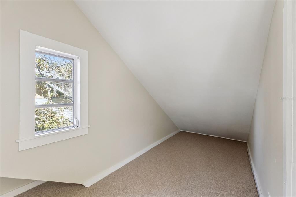 5108 South Ridgewood Avenue Port Orange, FL 32127 - Photo 29 of 44 an empty room with a window