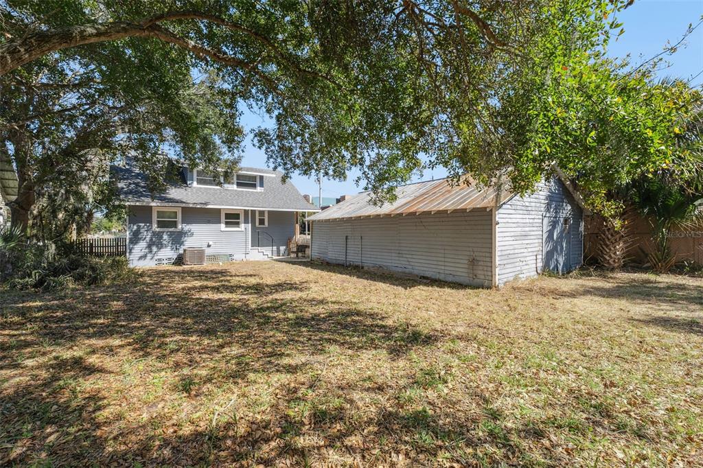 5108 South Ridgewood Avenue Port Orange, FL 32127 - Photo 36 of 44 a house view with a outdoor space