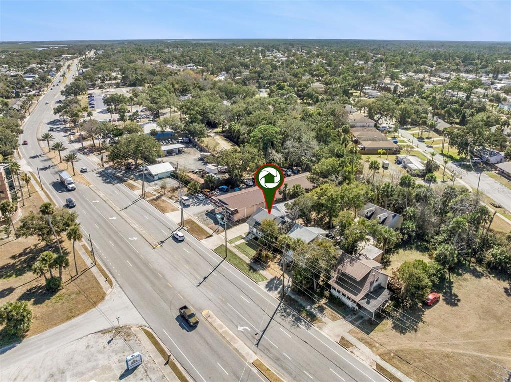5108 South Ridgewood Avenue Port Orange, FL 32127 - Photo 40 of 44 an aerial view of multiple house