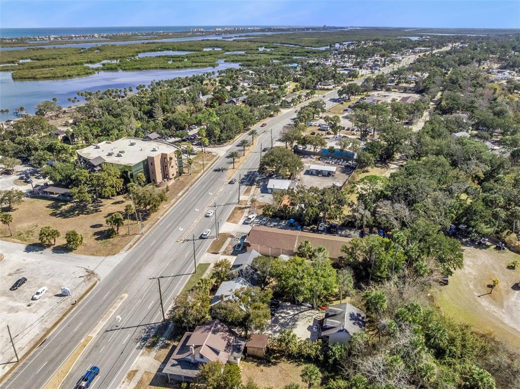 5108 South Ridgewood Avenue Port Orange, FL 32127 - Photo 41 of 44 a view of a city with an ocean