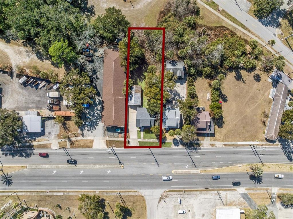 5108 South Ridgewood Avenue Port Orange, FL 32127 - Photo 42 of 44 an aerial view of multiple house
