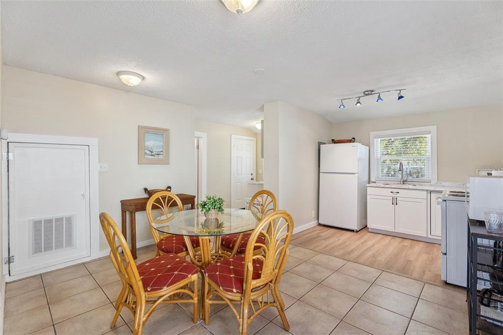 5108 South Ridgewood Avenue Port Orange, FL 32127 - Photo 10 of 44 a dining room with furniture and window