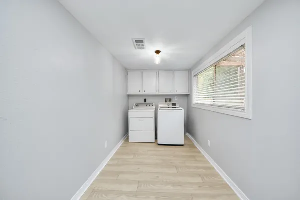 a view of an empty room with window