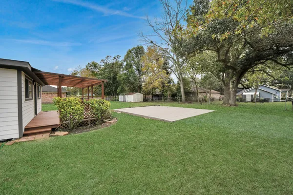 a view of a backyard with a garden