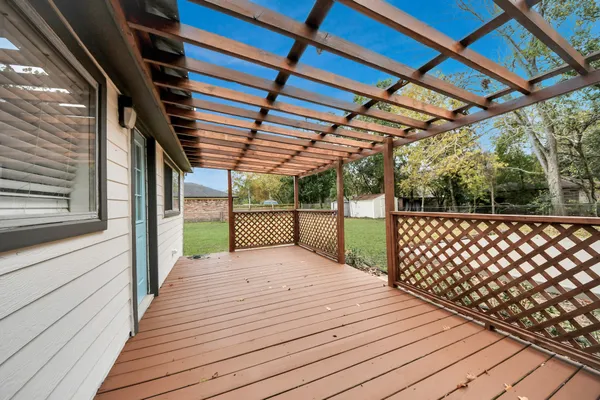 aerial view of a house with a garden and plants