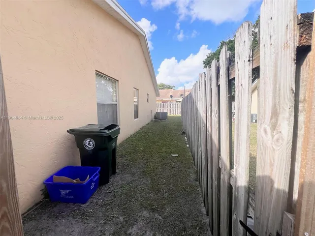 a view of a hallway with a couch
