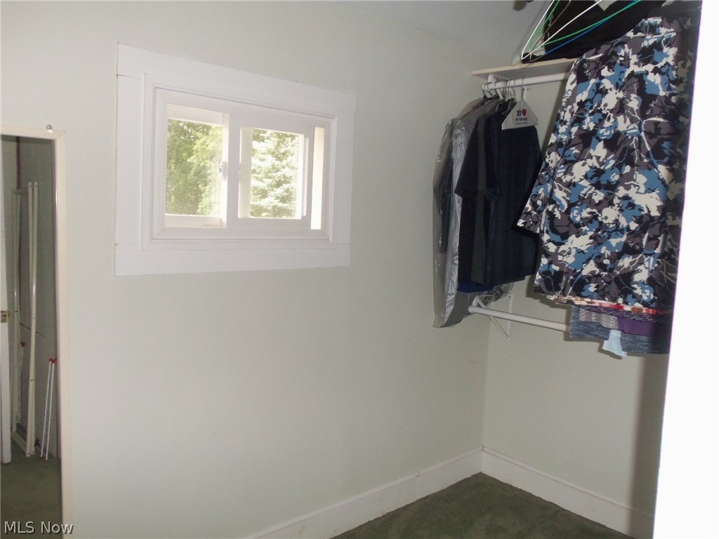 15330 Tavern Road Burton, OH 44021 - Photo 19 of 26 Walk-in closet/dressing room even has a nice window for light!