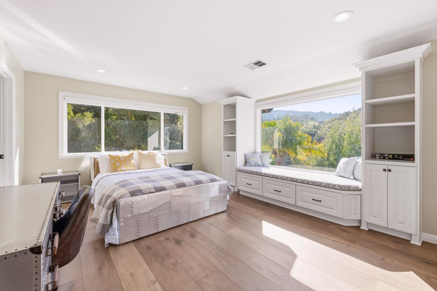 15965 Shannon Road Los Gatos, CA 95032 - Photo 29 of 53 a bedroom with a large bed and a large window