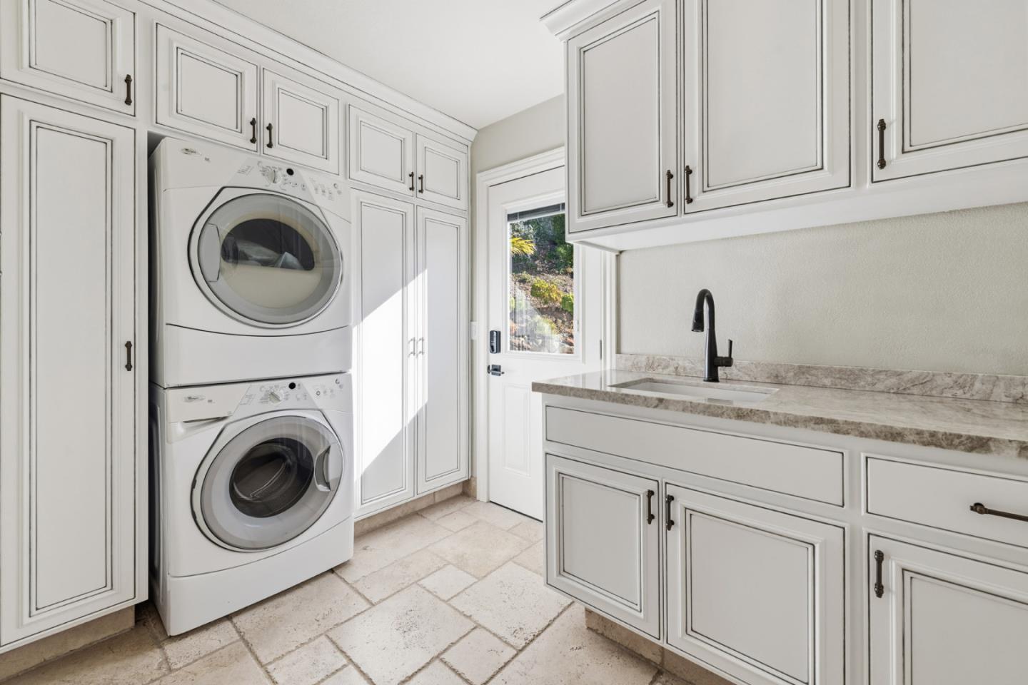 15965 Shannon Road Los Gatos, CA 95032 - Photo 31 of 53 a utility room with sink dryer and washer