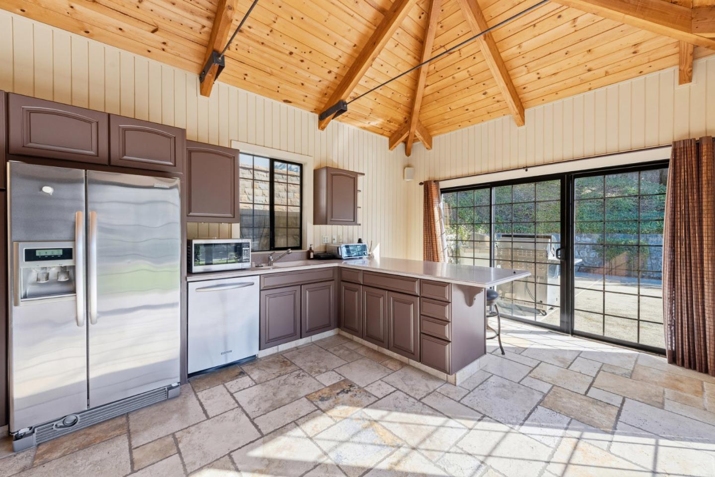 15965 Shannon Road Los Gatos, CA 95032 - Photo 41 of 53 a kitchen with stainless steel appliances granite countertop a refrigerator and a sink