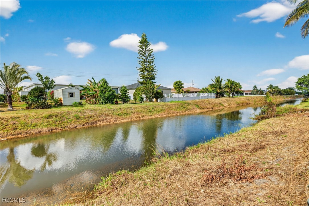 4664 Varsity Circle Lehigh Acres, FL 33971 - Photo 30 of 31 a view of a water with an outdoor space